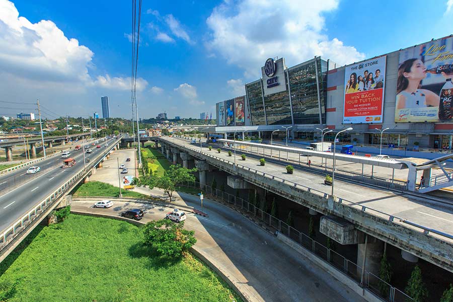 SM City Marikina is a mall on stilts, a safety feature that allows floodwater to flow through the development and away from nearby communities.
