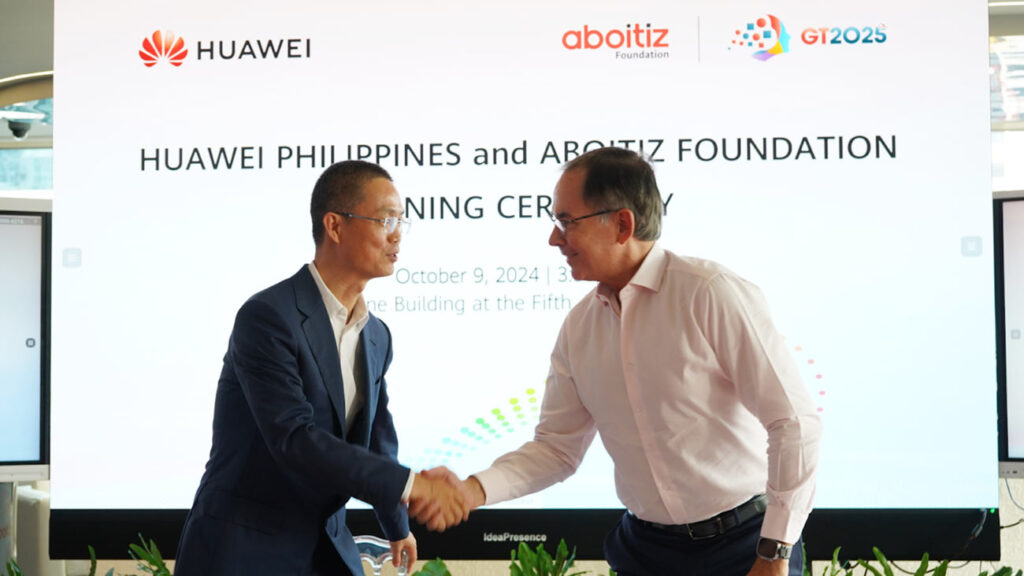 William Hu, vice president of Huawei Philippines (left) and Aboitiz celebrate the partnership that will power and connect last-mile schools across the country through the Aboitiz Foundation’s AuroraPH Project.