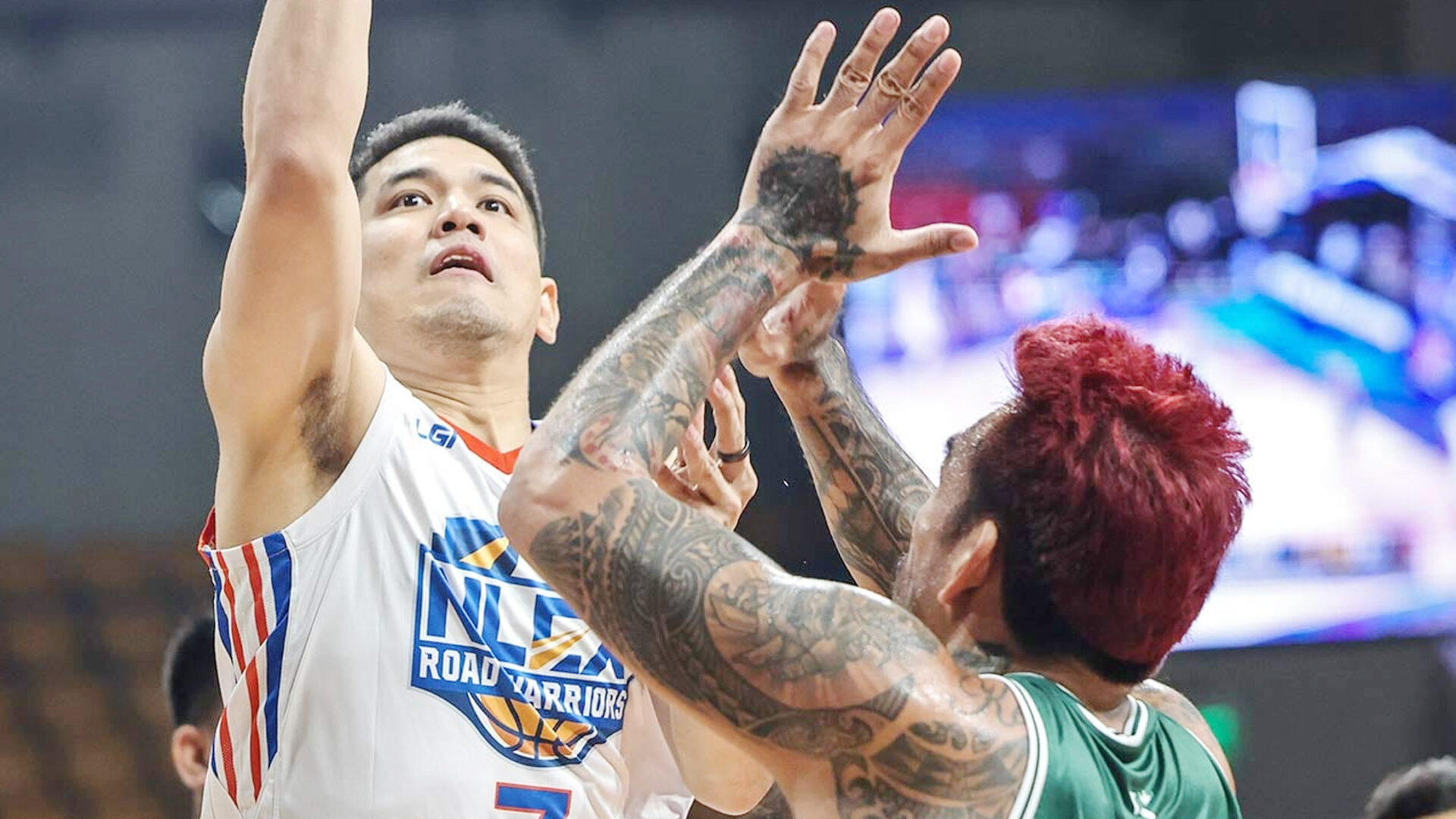 RETURNING ACE: NLEX star Kevin Alas shoots off Terrafirma veteran Vic Manuel in his comeback from an ACL injury in last night’s game.