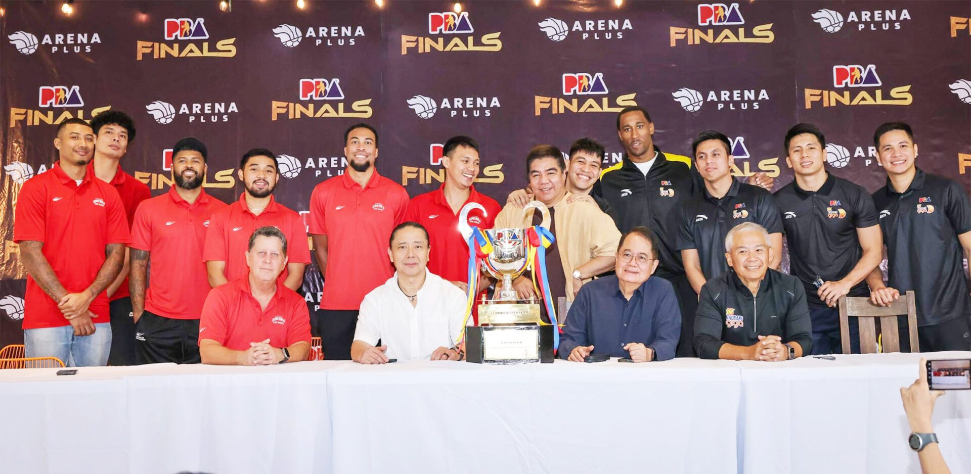 ALL SET: Ginebra coach Tim Cone (first from left, seated), PBA vice chairman and Kings governor Alfrancis Chua, chairman and TNT counterpart Ricky Vargas, and Tropang Giga tactician Chot Reyes share center stage with Ginebra players Jamie Malonzo (standing from left), Japeth Aguilar, Maverick Ahanmisi, RJ Abarrientos, Stephen Holt and Scottie Thompson, PBA chief Willie Marcial, TNT cagers Calvin Oftana, Rondae Hollis-Jefferson, Rey Nambatac, Kim Aurin, and Roger Pogoy.