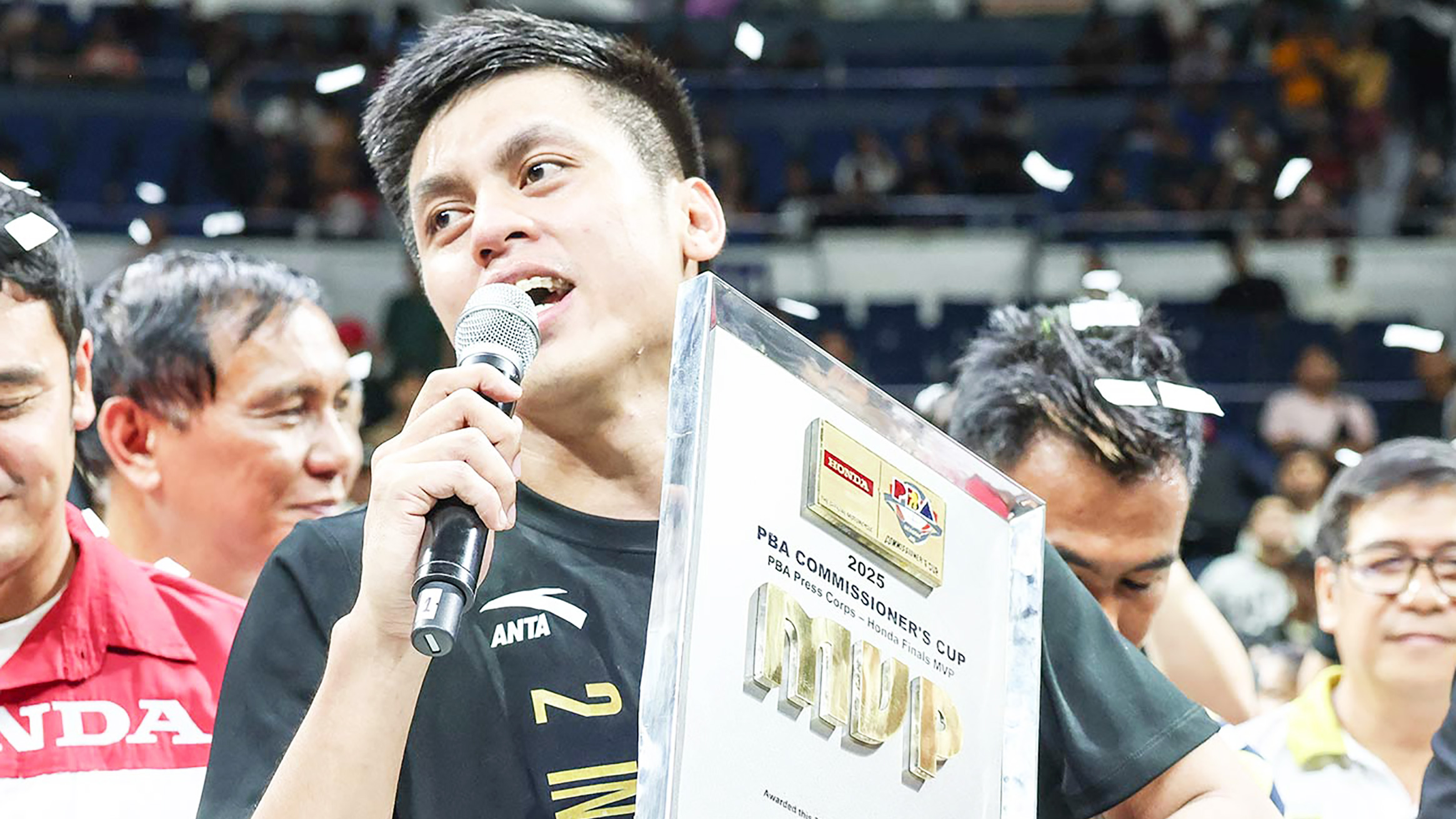 BEST OF ‘EM: Tropang Giga star playmaker Rey Nambatac beams after winning the finals MVP award.