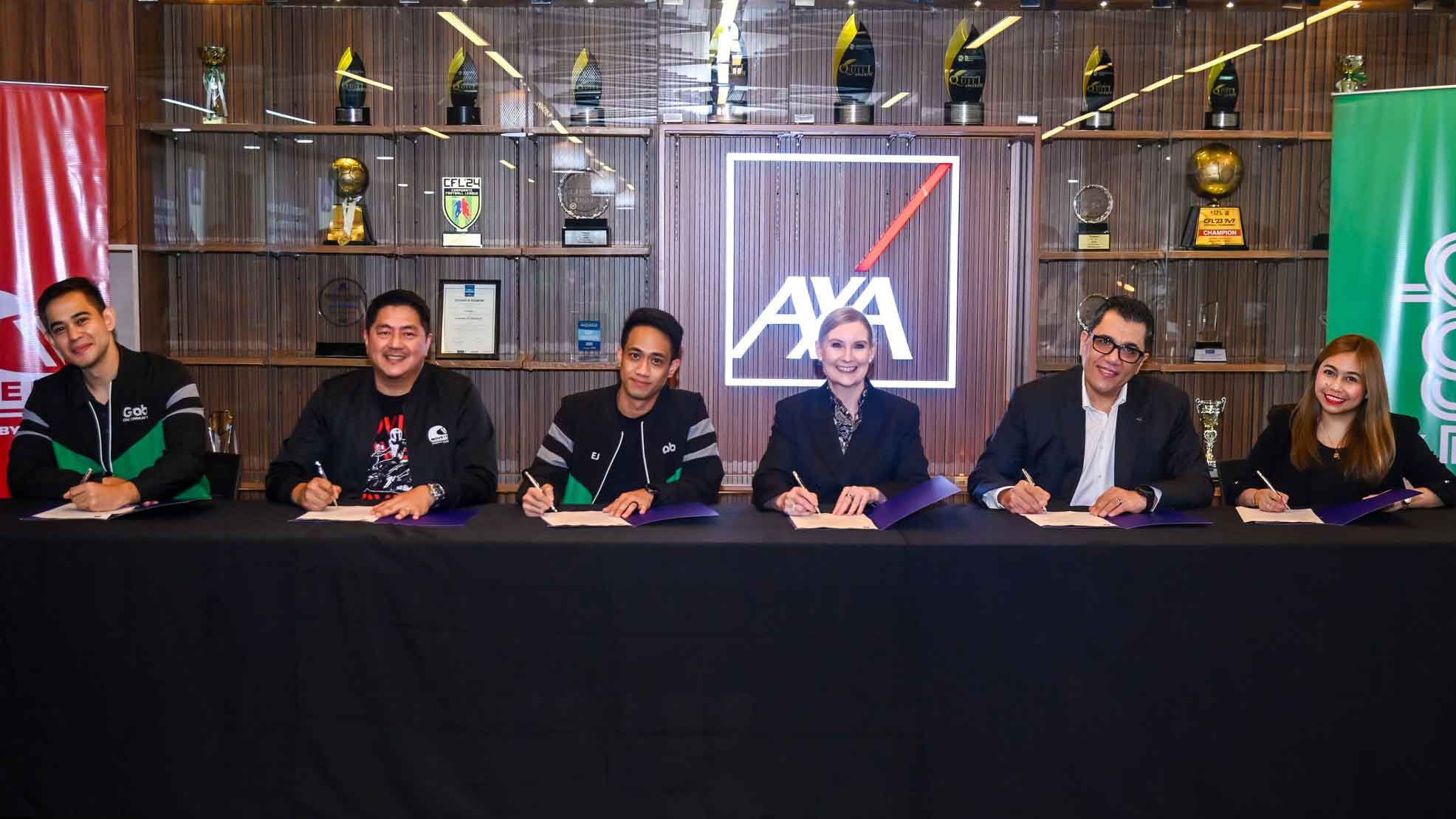 Grab and MOVE IT forge a partnership with AXA Philippines and Philinsure to provide free life insurance to top-performing driver and rider partners. [L-R] Grab Philippines Head of Public Affairs Gio Tingson, MOVE IT General Manager Wayne Jacinto, Grab Philippines Director for Mobility EJ Dela Vega, AXA Southeast Asia and Korea CEO Sally O’Hara, AXA Philippines CEO Ayman Kandil, and Philinsure Vice President for Client Servicing Roxanne Agustin