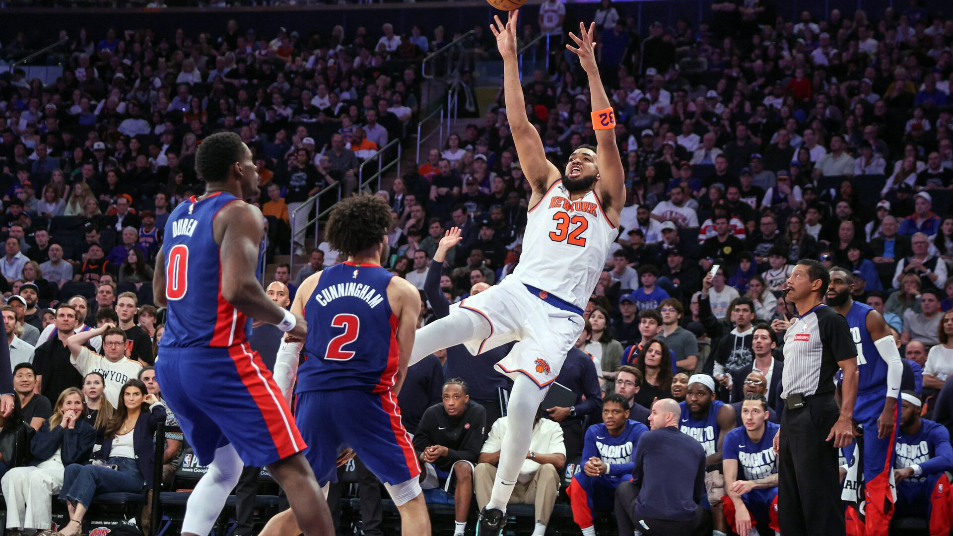 WILY: Knicks center Karl-Anthony Towns (32) takes a jump shot off the Pistons’ Cade Cunningham in yesterday’s game.